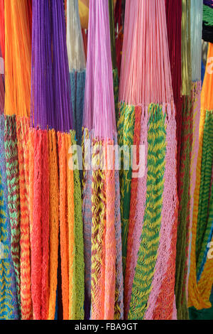 Colourful hammocks on sale at Anjuna's Wednesday flea market, Anjuna beach, North Goa, India Stock Photo