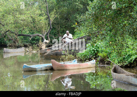 A local fisherman on the Mandovi River, near Old Goa (Velha Goa), North Goa, India Stock Photo