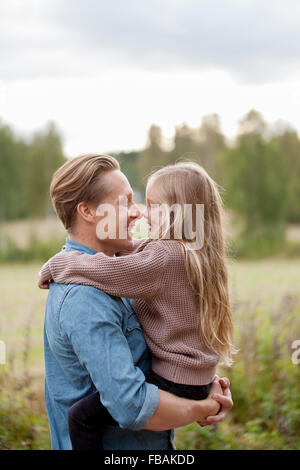 Finland, Uusimaa, Raasepori, Karjaa, Father and daughter (6-7) rubbing noses
