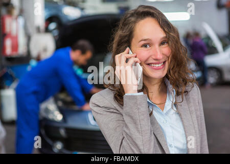 View of an Expert in autobile working in a garage Stock Photo