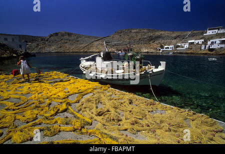 Girl, Fishing boat, Heronissos, Sifnos, Cyclades, Greece Stock Photo