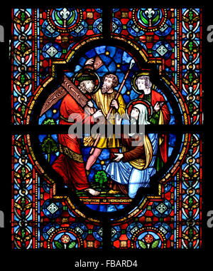 Dinant, Belgium. Eglise Notre-Dame. Stained glass window. Christ carrying the cross Stock Photo