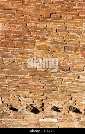 Light on the walls at Pueblo Bonito create an abstract photo in Chaco Culture National Historic Park, New Mexico. Stock Photo