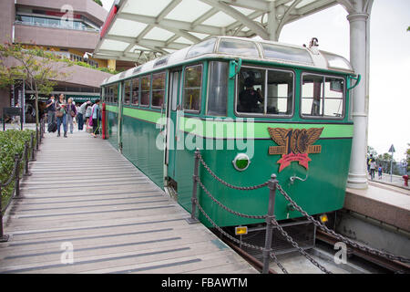 1956 Hong Kong Victoria Peak Tram Car plinthed at upper terminus,carrying a headboard celebrating the lines centenary in 1988 Stock Photo