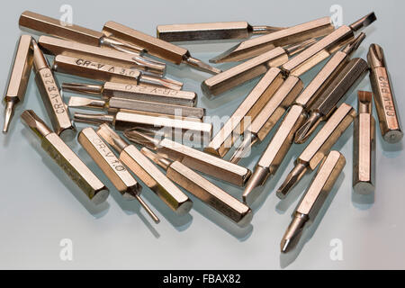 bits for screwdriver on glass background Stock Photo