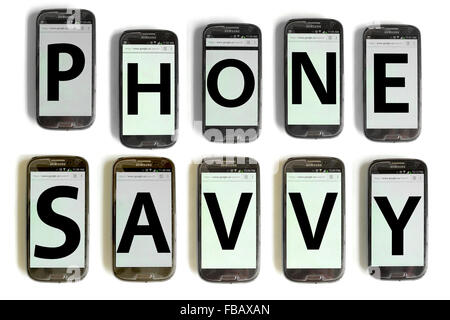 Phone Savvy spelled out on mobile phone screens photographed against a white background. Stock Photo