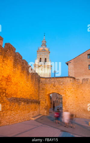 Gate of the city wall and cathedral, night view. El Burgo de Osma, Soria province, Castilla Leon, Spain. Stock Photo