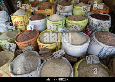 An assortment of sacks filled with different spices on sale at Kandy fruit & vegetable market in Kandy, Sri Lanka Stock Photo