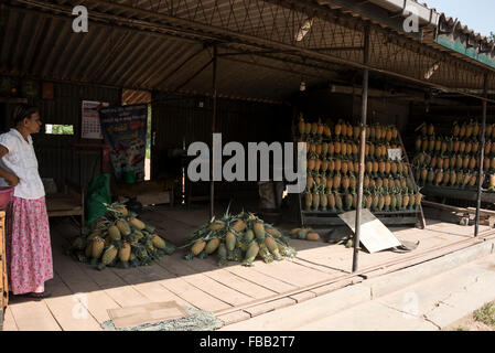 Locally grown pineapples on sale beside the the A1 highway (Colombo- Kandy road)  in Sri Lanka Stock Photo