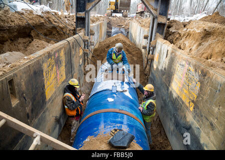 Columbiaville, Michigan USA - 13th January 2016 - Construction of a water pipeline for Flint, Michigan and surrounding areas. The pipeline will take water from Lake Huron through a 70-mile pipeline. Flint's decision to draw its water from the Flint River until construction is complete--instead of continuing to buy it from Detroit--has led to elevated levels of lead in Flint children. Credit:  Jim West/Alamy Live News Stock Photo