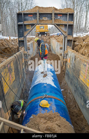 Columbiaville, Michigan USA - 13th January 2016 - Construction of a water pipeline for Flint, Michigan and surrounding areas. The pipeline will take water from Lake Huron through a 70-mile pipeline. Flint's decision to draw its water from the Flint River until construction is complete--instead of continuing to buy it from Detroit--has led to elevated levels of lead in Flint children. Credit:  Jim West/Alamy Live News Stock Photo