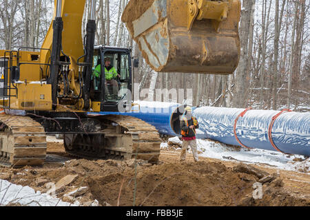 Columbiaville, Michigan USA - 13th January 2016 - Construction of a water pipeline for Flint, Michigan and surrounding areas. The pipeline will take water from Lake Huron through a 70-mile pipeline. Flint's decision to draw its water from the Flint River until construction is complete--instead of continuing to buy it from Detroit--has led to elevated levels of lead in Flint children. Credit:  Jim West/Alamy Live News Stock Photo