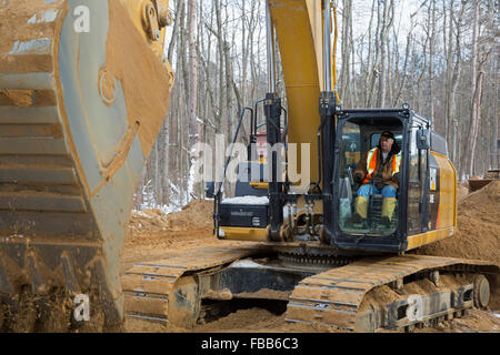 Columbiaville, Michigan USA - 13th January 2016 - Construction of a water pipeline for Flint, Michigan and surrounding areas. The pipeline will take water from Lake Huron through a 70-mile pipeline. Flint's decision to draw its water from the Flint River until construction is complete--instead of continuing to buy it from Detroit--has led to elevated levels of lead in Flint children. Credit:  Jim West/Alamy Live News Stock Photo