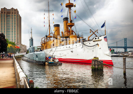 View of The Olympia Warship and the Becuna Submarine Docked at The Independence Seaport Museum, Philadelphia, Pennsylvania Stock Photo