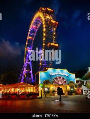 Low Angle Nighttime View of a Giant Ferris Wheel , Prater Amusement Park, Leopolstadt, Vienna, Austria Stock Photo