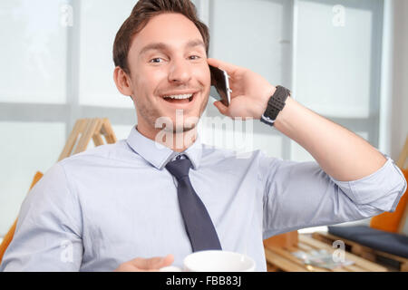 Call center operator having conversation. Stock Photo