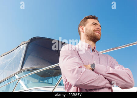 Nice man bending his hands Stock Photo