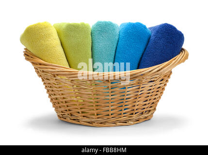Wicker Basket with Folded Towels Isolated on White Background. Stock Photo