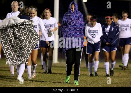 Palm Harbor, Florida, USA. 13th Jan, 2016. DOUGLAS R. CLIFFORD | Times.The chill in the air is evident as the Palm Harbor University High School girls varsity soccer team returns to the filed after a halftime break during Wednesday's (1/13/16) girls soccer: 5A-7 district tournament with Steinbrenner High School at Palm Harbor. © Douglas R. Clifford/Tampa Bay Times/ZUMA Wire/Alamy Live News Stock Photo