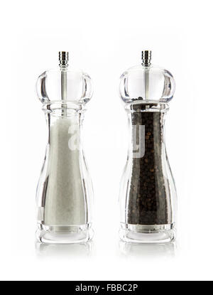 Salt and Pepper grinders on white background Stock Photo