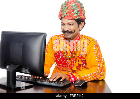 1 indian Rural Gujrati man Computer Education Stock Photo