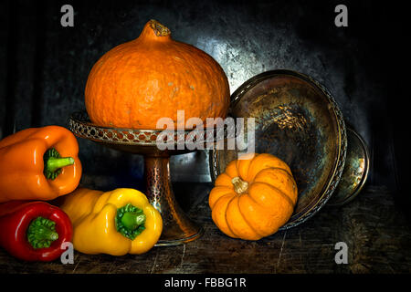 Pumpkin, squash and a selection of Romano peppers in vintage style Stock Photo
