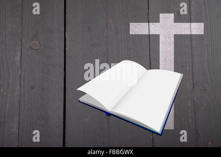 Illustration of white bible and cross on dark black wooden background Stock Photo