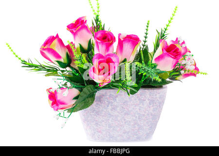 Pink fabric roses in vase isolated on white background. Stock Photo