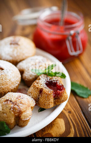 sweet muffins with fruit jam inside Stock Photo - Alamy