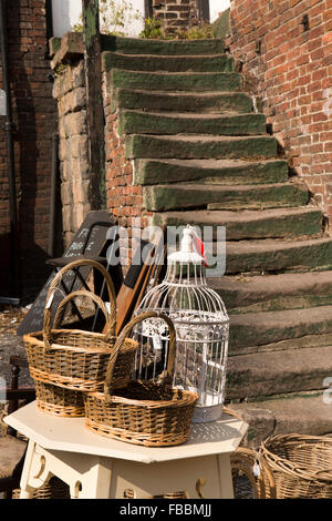 UK, England, Derbyshire, Cromford, Market Square Antiques and Hardware shop, stock outside by well-worn stone steps Stock Photo