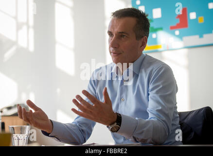 Waldenbuch, Germany. 8th Dec, 2015. Chairman of the management board of chocolate manufacturer Ritter Sport, Andreas Ronken, speaks during an interview in his office at the company headquarter in Waldenbuch, Germany, 8 December 2015. Photo: Daniel Maurer/dpa/Alamy Live News Stock Photo