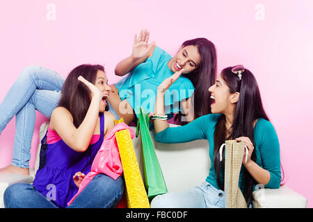 3 indian Young Womans friends shopping Clapping Stock Photo