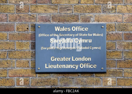 London, England, UK. Wales Office at Gwydyr House,  Whitehall. Bilingual sign by the door: English / Welsh - 2016 Stock Photo