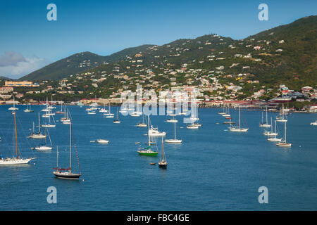 Harbor in St. Thomas, U.S. Virgin Islands, with sailboats and tropical island. Stock Photo