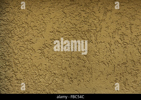 Close-up of stucco wall texture sandy color Stock Photo