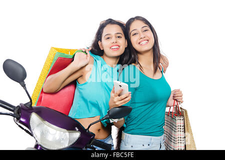 2 indian Young Womans friends Shopping Stock Photo