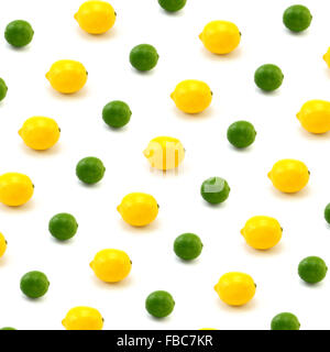 Lime and lemon photographed against white background in a studio. Photographed on March 29, 2015. Stock Photo