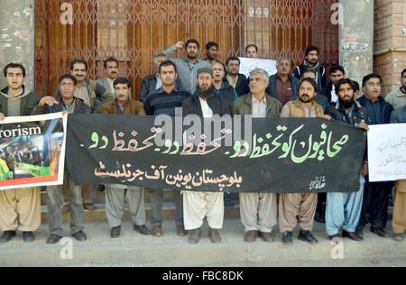 Members of Balochistan Union of Journalists chant slogans against the attack on private TV Chanel in Islamabad last night during protest demonstration at Quetta press club on Thursday, January 14, 2016. Stock Photo