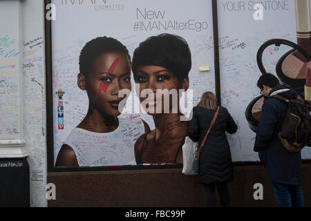London, UK. 13th Jan, 2016. Fans pay tribute to David Bowie who died of cancer at the age of 69 on January 10th 2016 at a mural in Brixton where he was born. Jimmy C Graffiti. London,13/01/16 Credit:  claire doherty/Alamy Live News