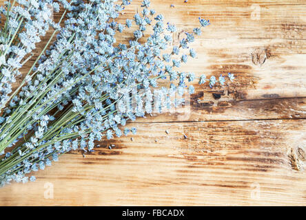 Natural Lavender Bunch on Wooden Background Stock Photo