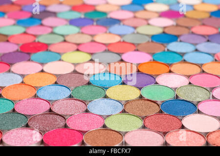 Background with large group of colored eyeshadow Stock Photo