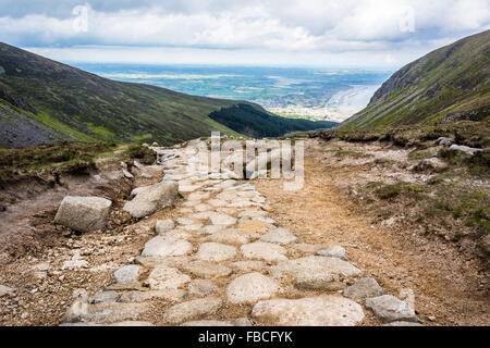 A rocky path leading down Donard mountain towards Newcastle, County Down, Ireland Stock Photo