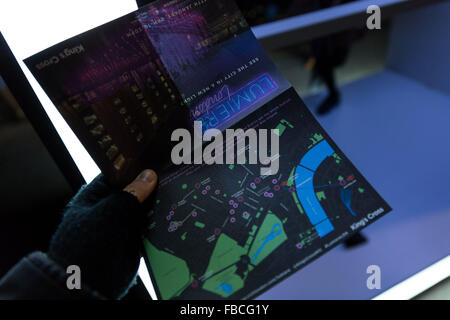 London, UK. 14th Jan, 2016. Hand keeping the Lumiere London 2016 Map. Thousands of people attend the first night of Lumiere London 2016 at King’s Cross. Produced by Artichoke and supported by the Mayor of London, for four evenings in January a host of international artists illuminate the city from 6:30pm to 10:30pm each night. Credit:  Cecilia Colussi/Alamy Live News Stock Photo