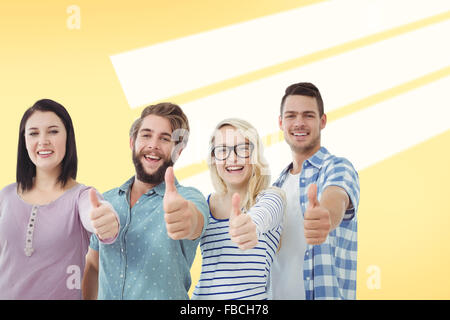Composite image of portrait of cheerful business people with thumbs up Stock Photo