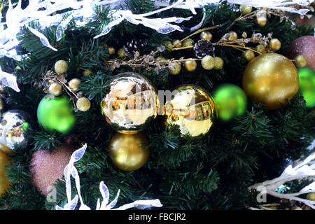 Close up of Christmas ornaments on a Christmas tree Stock Photo