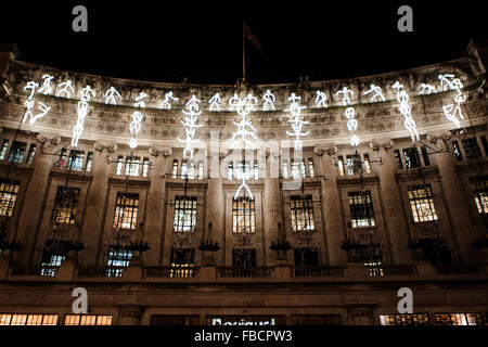 London, UK. 14th January, 2016. Animated figures created by Groupe LAPS. Using light in urban environments to tell stories which enchant audiences. Credit:  martyn wheatley/Alamy Live News Stock Photo