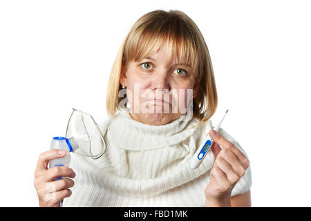 Sick woman holding digital thermometer and inhaler isolated on white Stock Photo