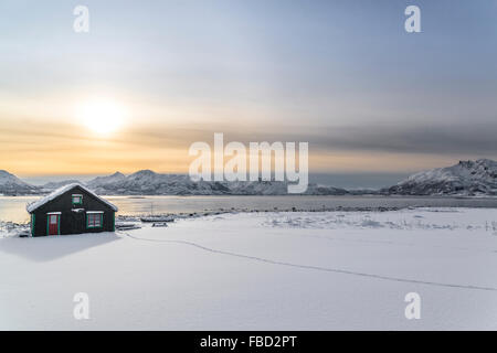 Cottage by the fjord near Holmstad, Vesterålen, Norway Stock Photo