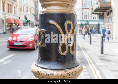 Street lamp with the logo of the fashion designer Coco Chanel, London, United Kingdom Stock Photo