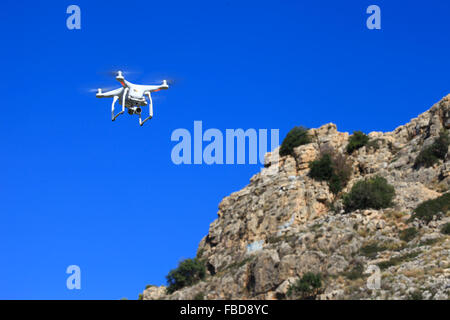 White drone equipped with high resolution 4K video camera Stock Photo